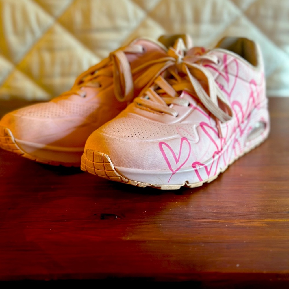 Pink Skechers with hearts